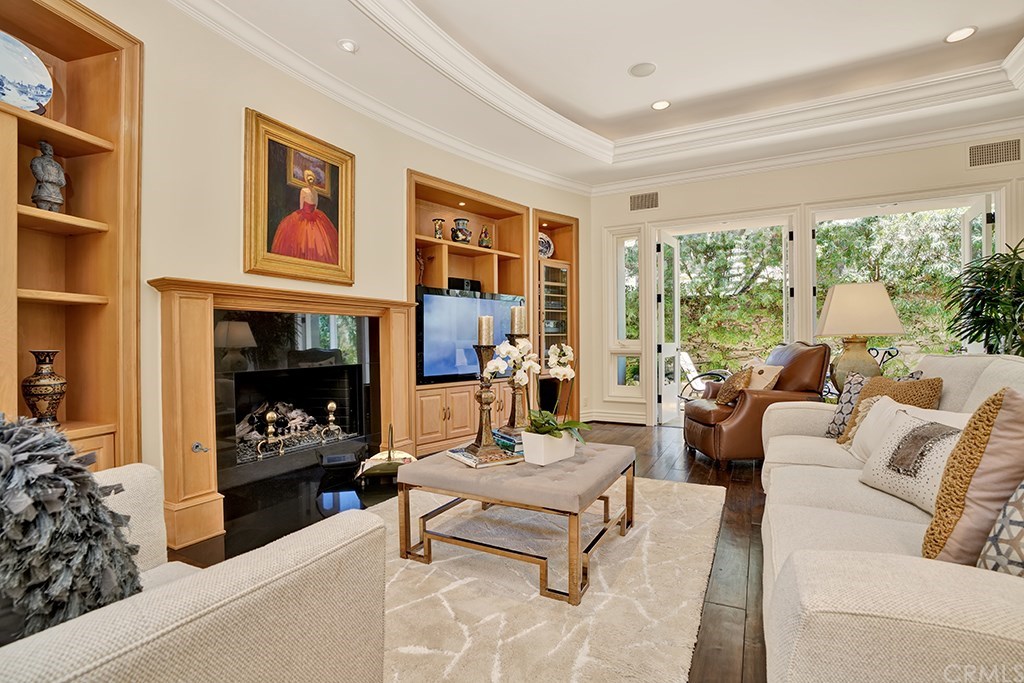 34 Smithcliffs Road Laguna Beach, CA 92651 - Photo 41 of 69 a living room with furniture and a fireplace