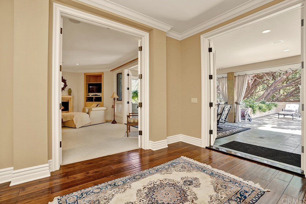 34 Smithcliffs Road Laguna Beach, CA 92651 - Photo 42 of 69 a view of a livingroom with wooden floor and a large window with rug