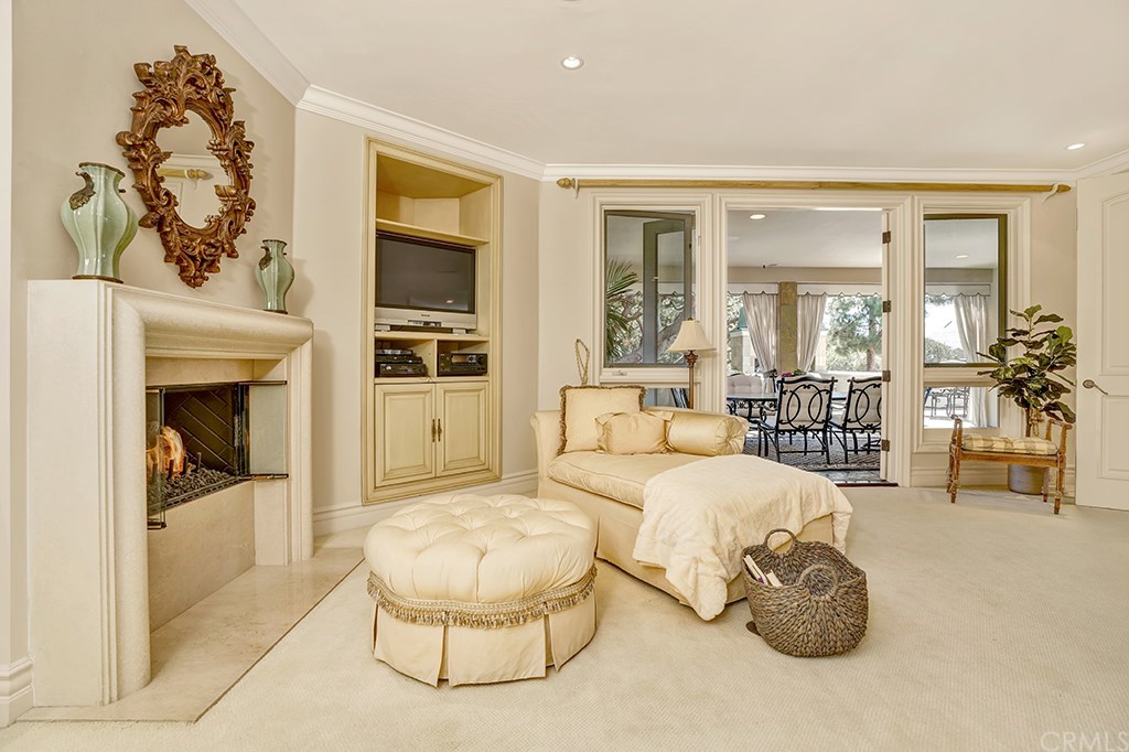 34 Smithcliffs Road Laguna Beach, CA 92651 - Photo 47 of 69 a living room with furniture and a fireplace
