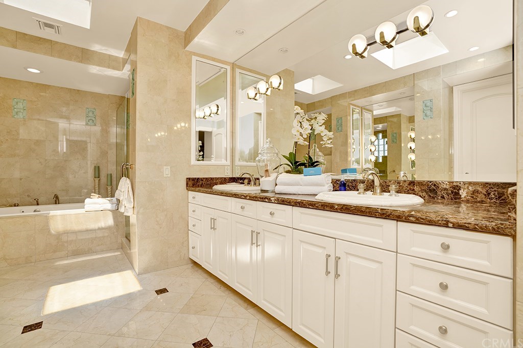 34 Smithcliffs Road Laguna Beach, CA 92651 - Photo 49 of 69 a bathroom with a sink double vanity and a mirror