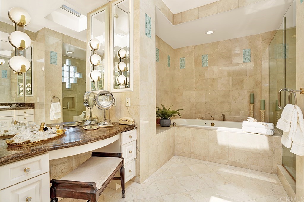 34 Smithcliffs Road Laguna Beach, CA 92651 - Photo 50 of 69 a bathroom with a granite countertop sink and a mirror