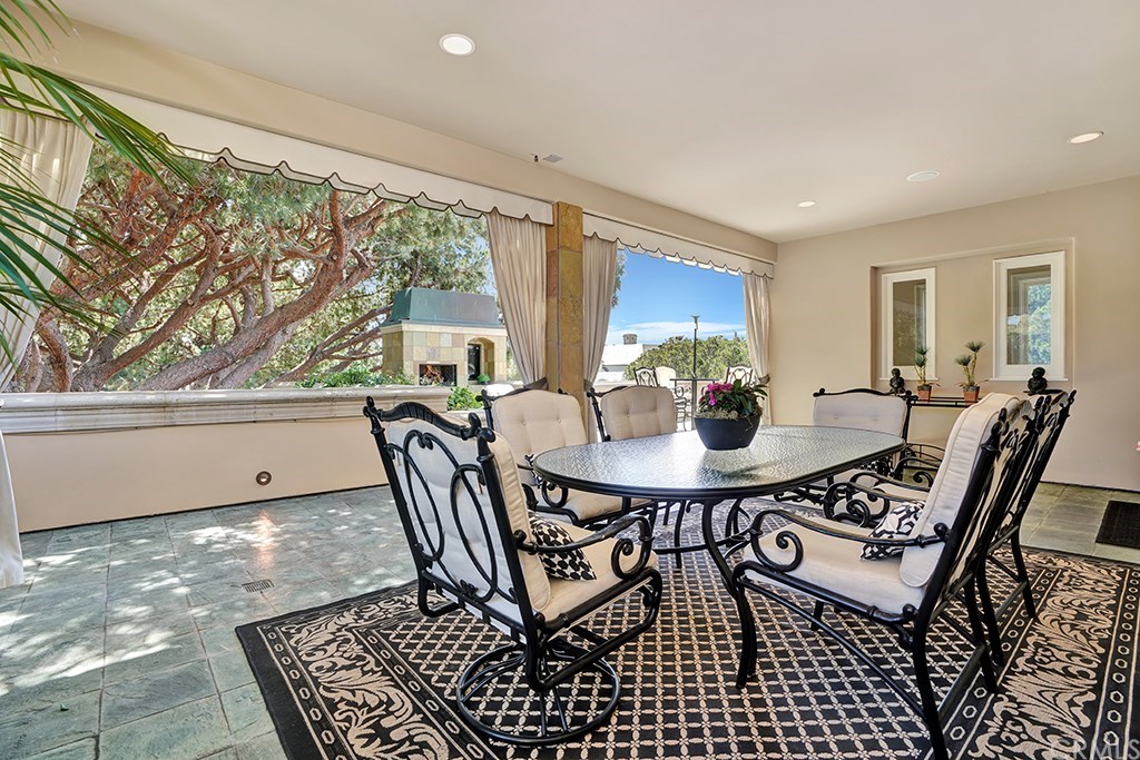 34 Smithcliffs Road Laguna Beach, CA 92651 - Photo 53 of 69 a view of a dining room with furniture window and outside view