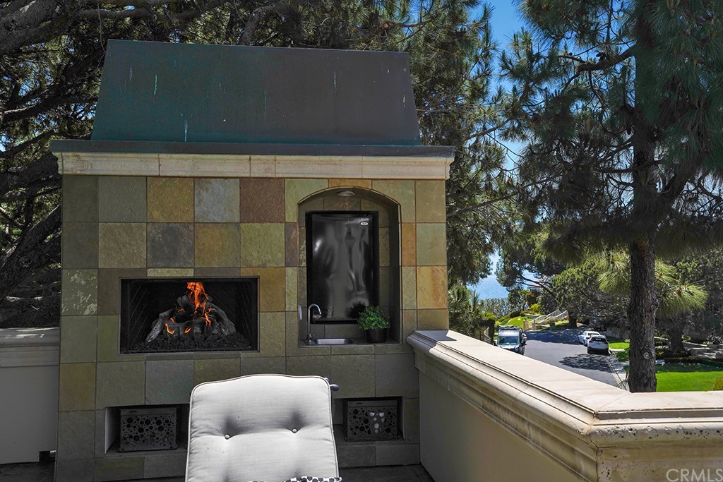 34 Smithcliffs Road Laguna Beach, CA 92651 - Photo 56 of 69 a front view of a house with garden