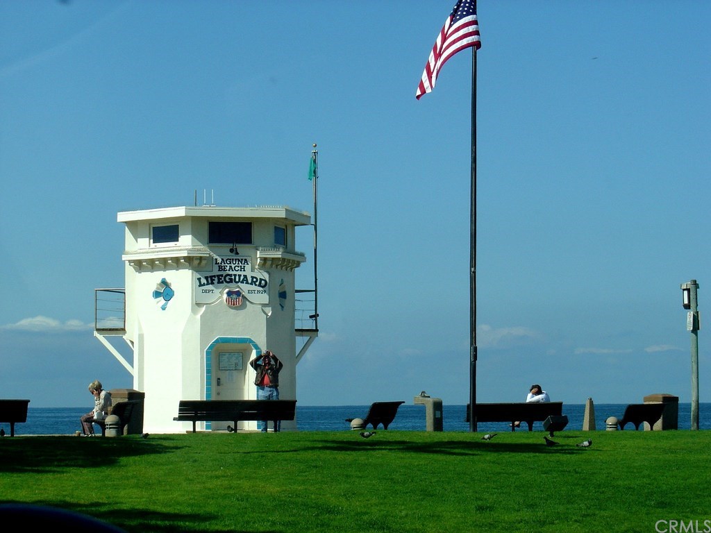 34 Smithcliffs Road Laguna Beach, CA 92651 - Photo 69 of 69 a front view of a house with garden