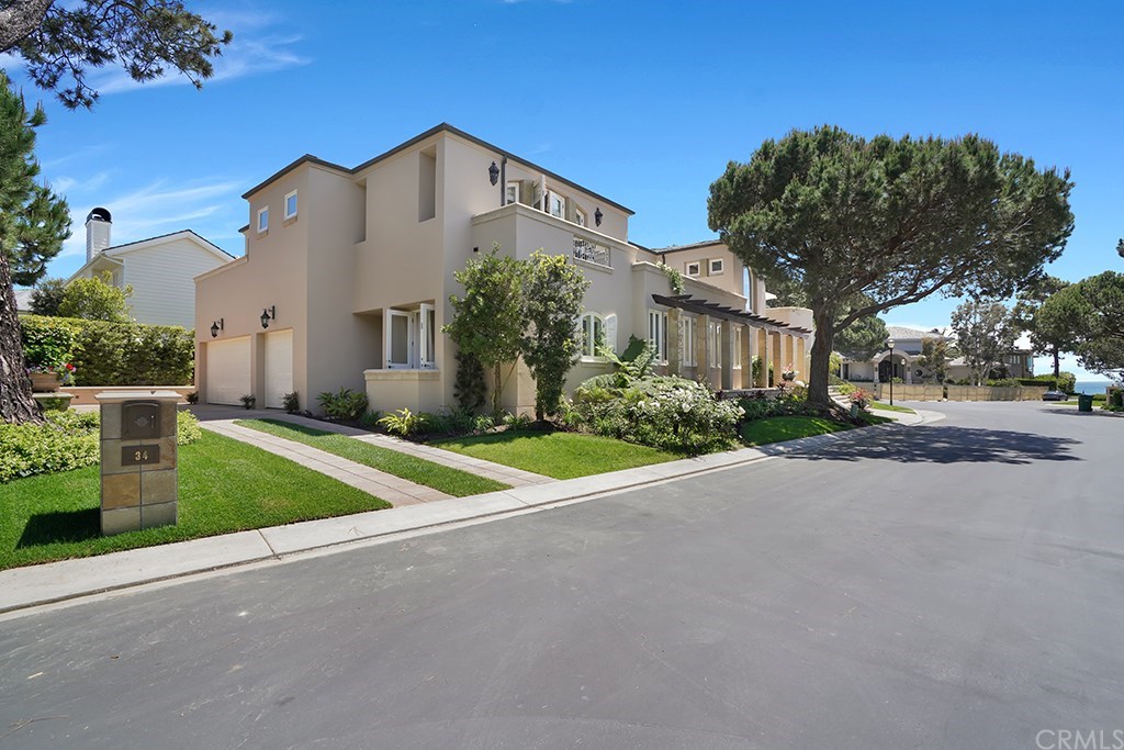 34 Smithcliffs Road Laguna Beach, CA 92651 - Photo 7 of 69 View of the ocean down the street, and wonderful three car garage accessible from the rear of the home.