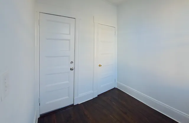 a view of small space with wooden floor