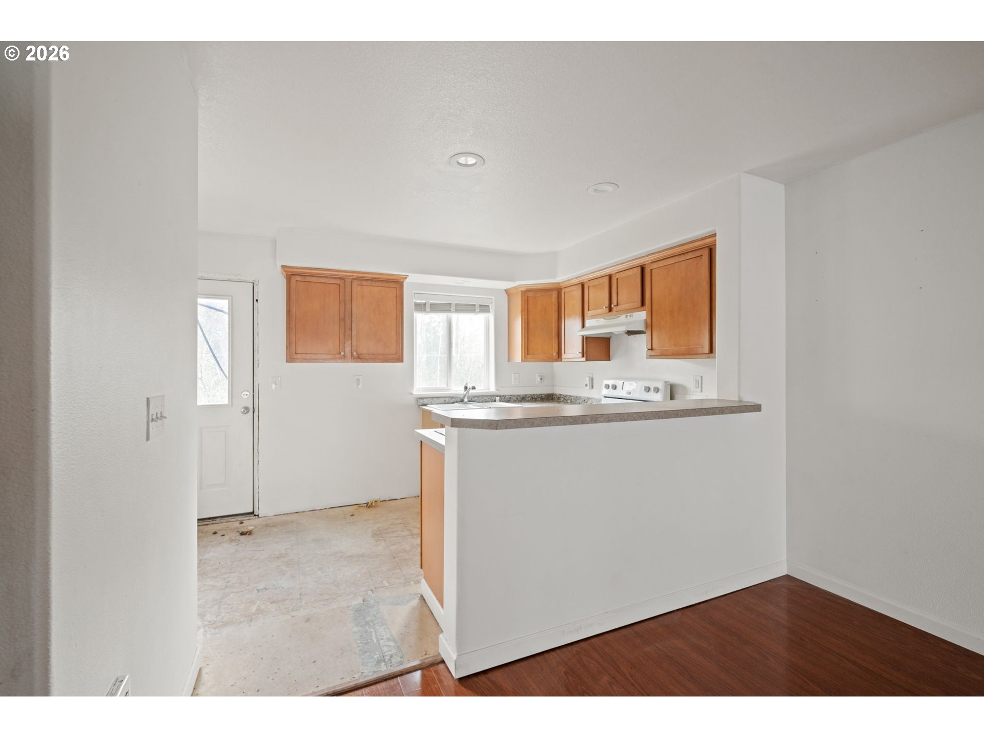 4416 Northeast Nicholson Loop Vancouver, WA 98661 - Photo 10 of 25 view of kitchen with granite countertop cabinets and sink