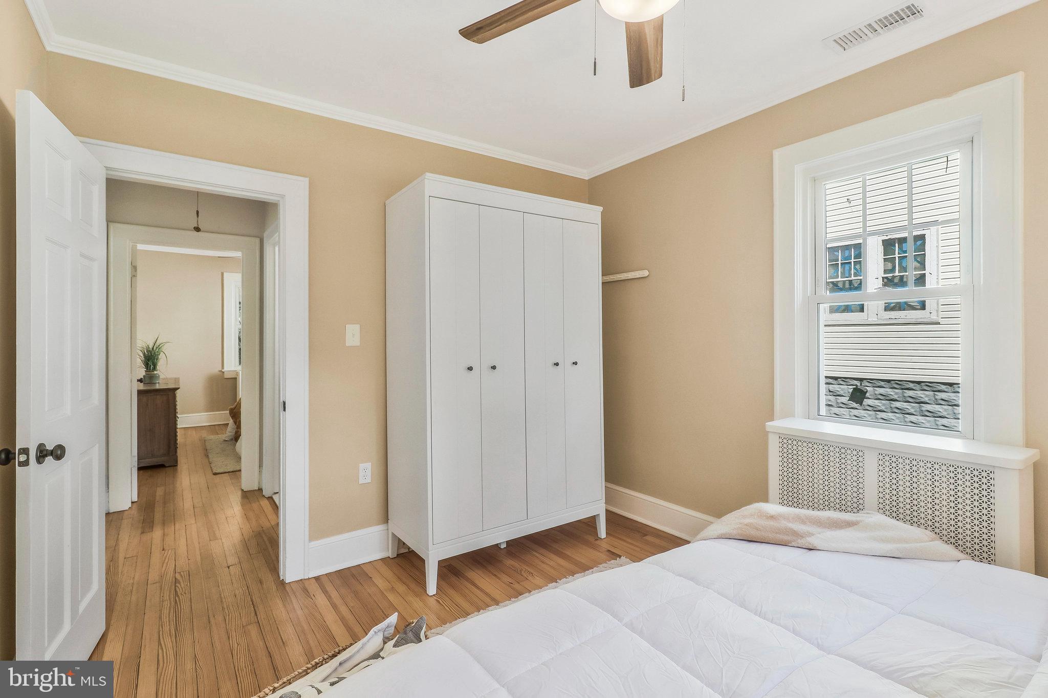 4101 Madison Street Hyattsville, MD 20781 - Photo 13 of 28 Rear corner BR with 2 windows and overhead fan.