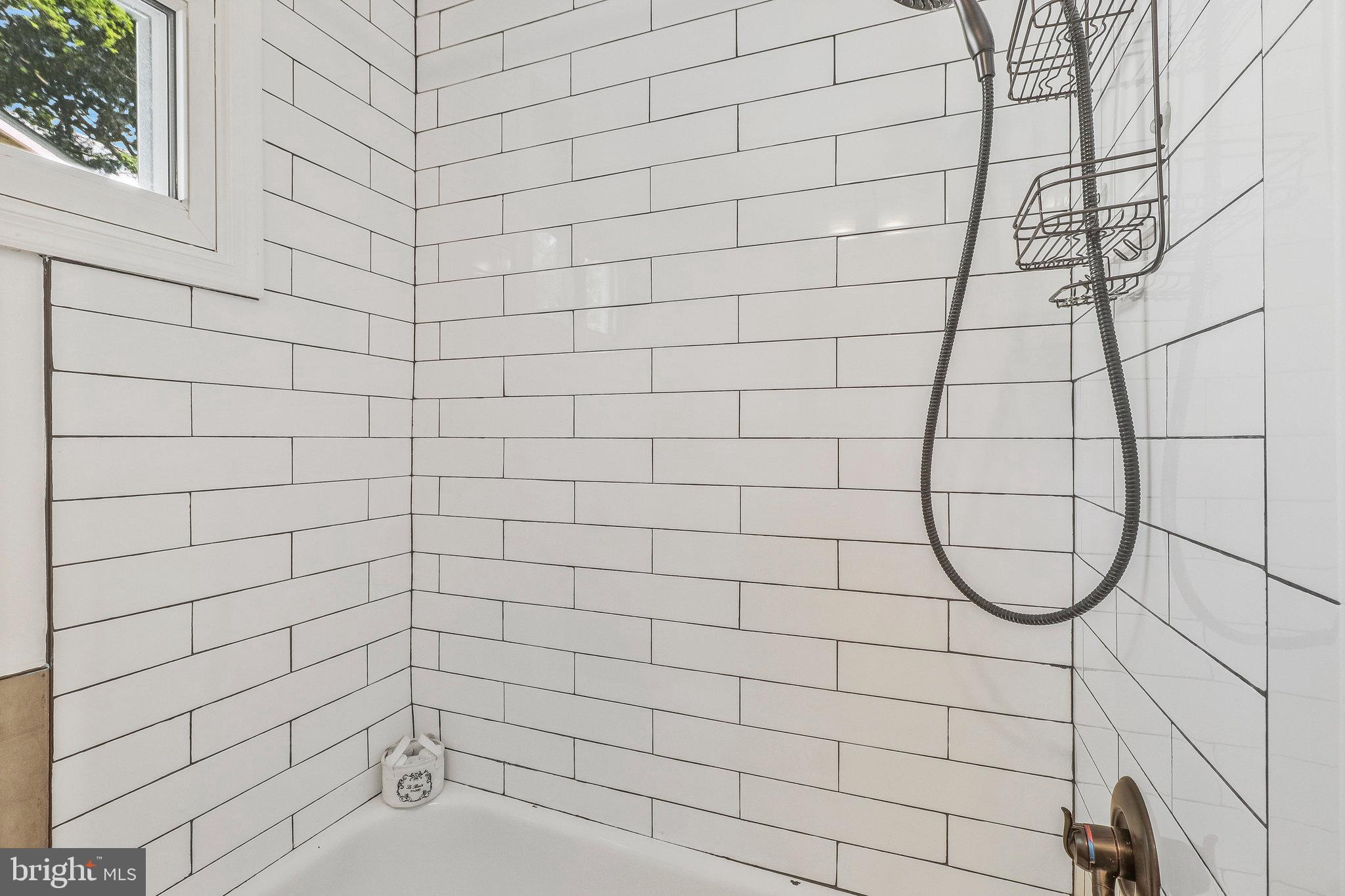 4101 Madison Street Hyattsville, MD 20781 - Photo 16 of 28 Clean white subway tile.