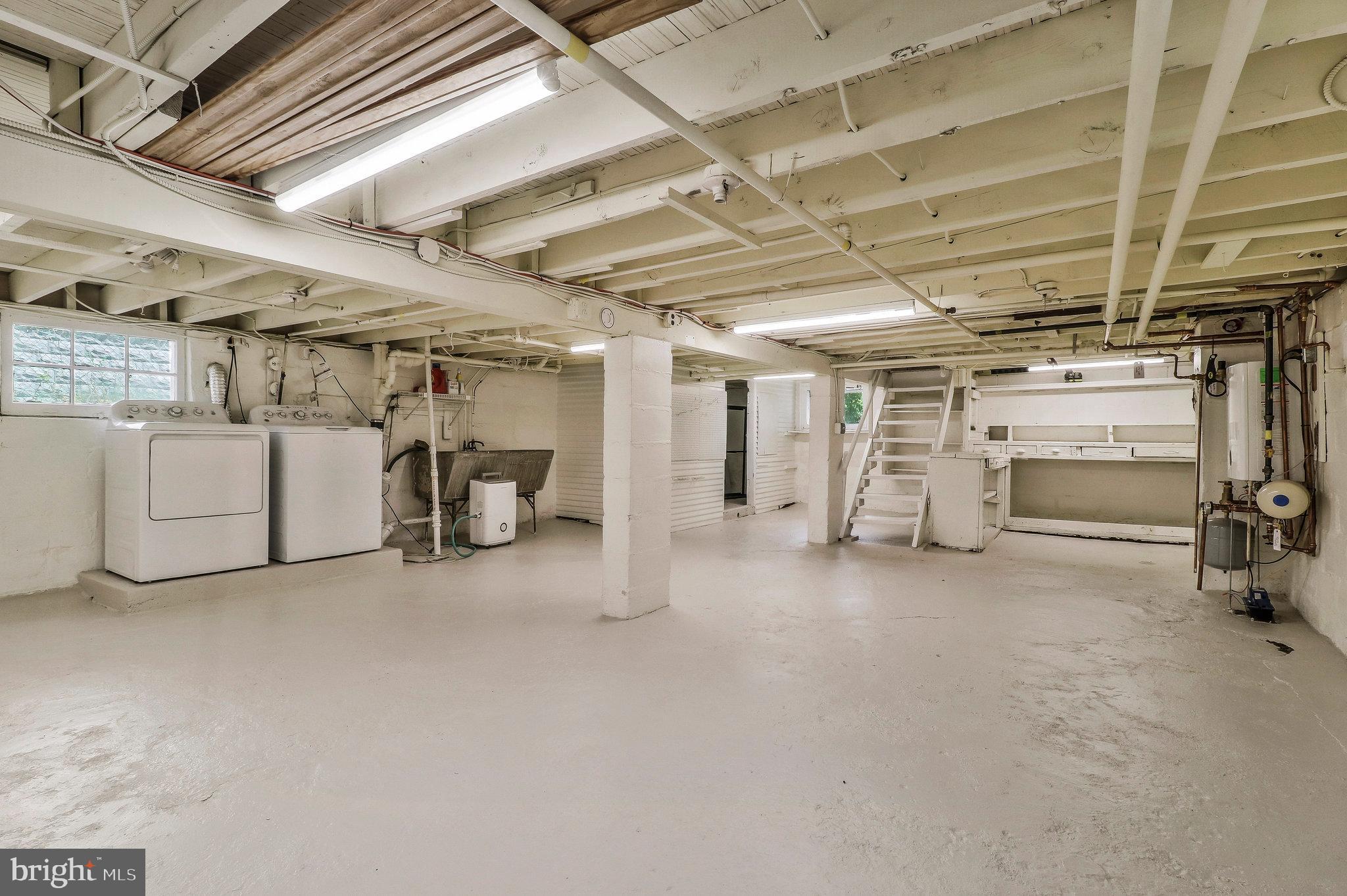 4101 Madison Street Hyattsville, MD 20781 - Photo 19 of 28 Open, unfinished basement with storage closet.