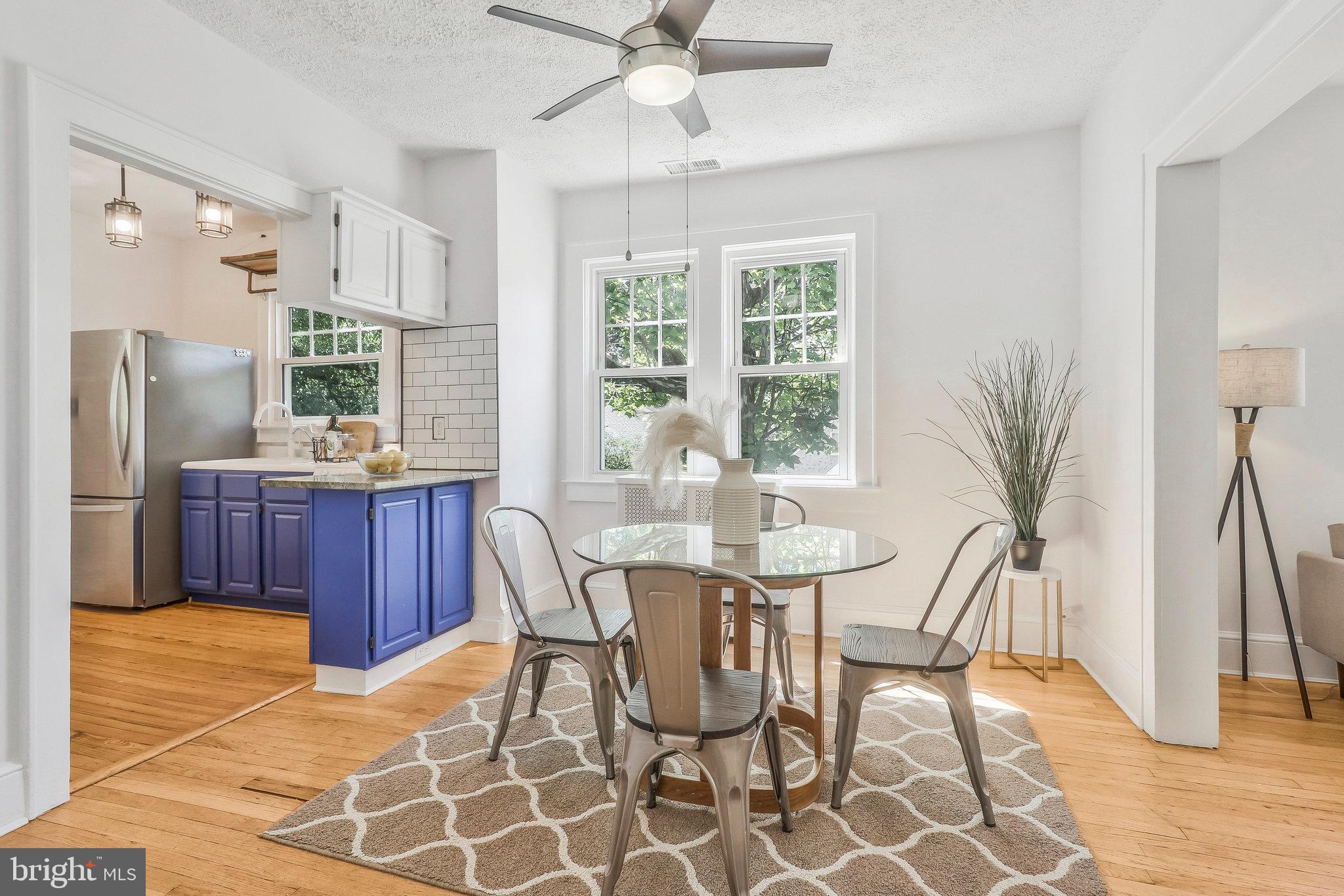 4101 Madison Street Hyattsville, MD 20781 - Photo 7 of 28 Dining Room with overhead fan and 2 windows.
