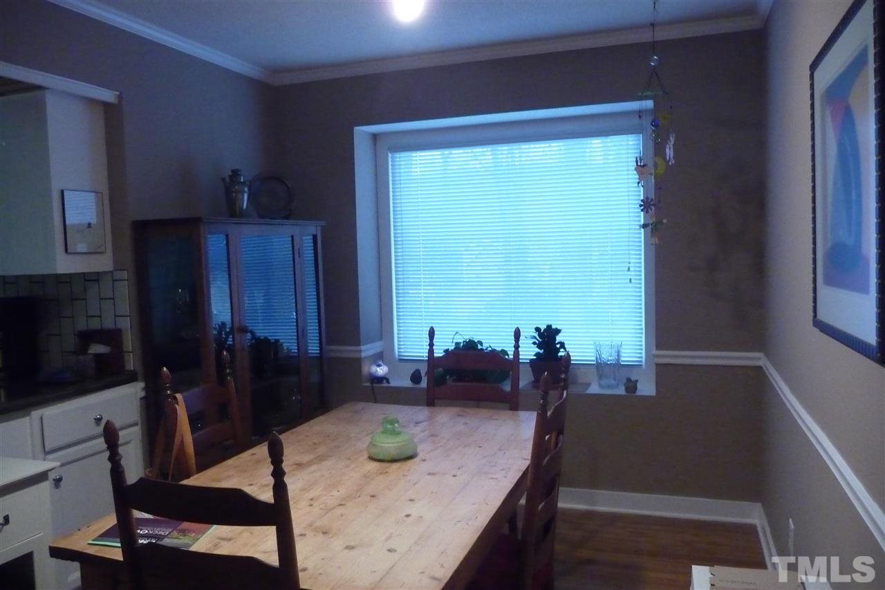 8705 Brandon Station Road Raleigh, NC 27613 - Photo 5 of 16 a view of kitchen with granite countertop dining room