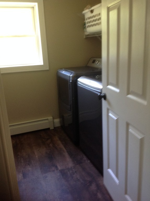 167 Winchendon Road Ashburnham, MA 01430 - Photo 14 of 23 a view of storage and utility room with washer and dryer