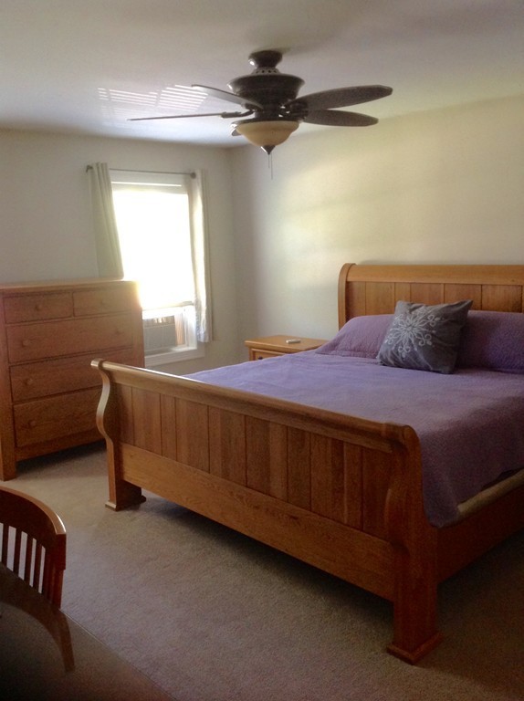 167 Winchendon Road Ashburnham, MA 01430 - Photo 17 of 23 a bedroom with a bed dresser and a window
