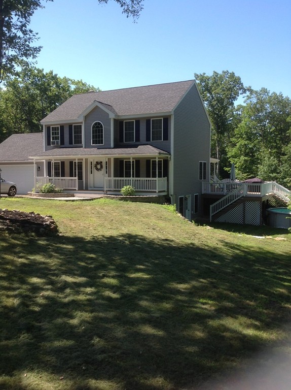 167 Winchendon Road Ashburnham, MA 01430 - Photo 2 of 23 a front view of a house with swimming pool having outdoor seating