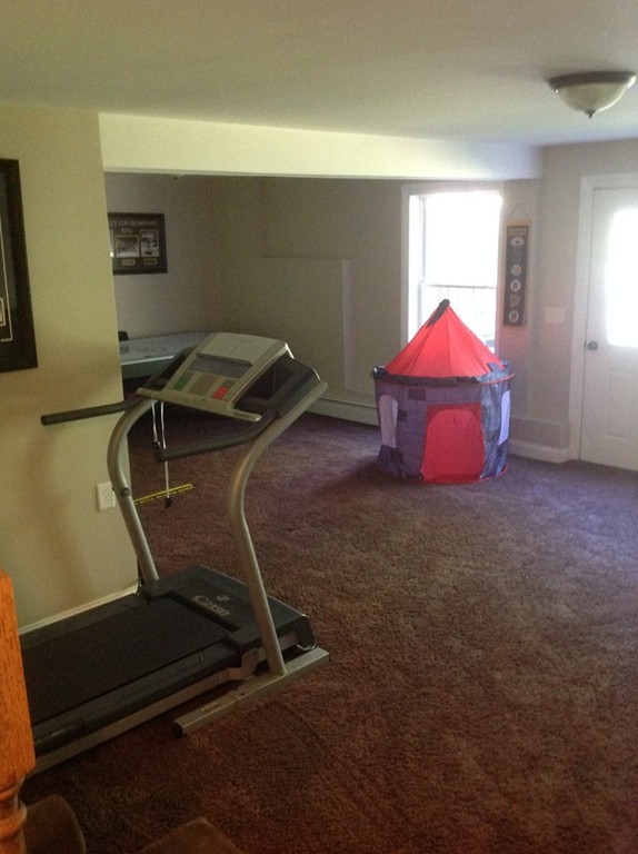 167 Winchendon Road Ashburnham, MA 01430 - Photo 22 of 23 a room with gym equipment