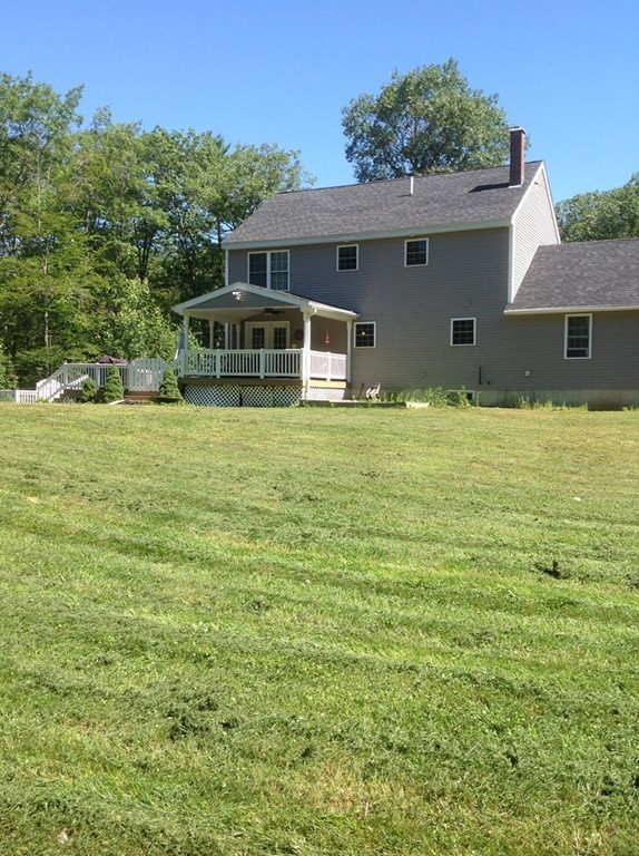 167 Winchendon Road Ashburnham, MA 01430 - Photo 3 of 23 a front view of a house with a garden