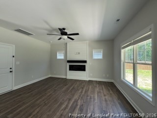 390 Summerhill Road Fayetteville, NC 28303 - Photo 3 of 27 wooden floor in an empty room with a window