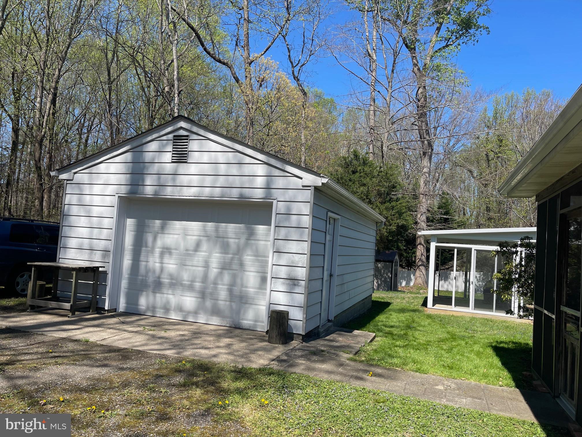 6070 Hill Road St. Leonard, MD 20685 - Photo 5 of 11 Garage and Patio Enclosure in back yard