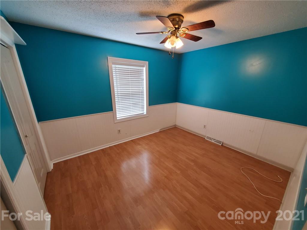 175 Old Airport Road Statesville, NC 28677 - Photo 6 of 15 a view of empty room with ceiling fan