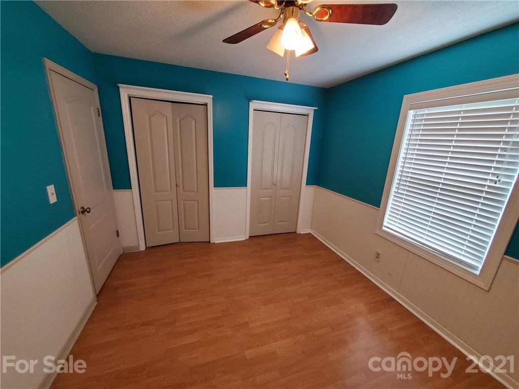 175 Old Airport Road Statesville, NC 28677 - Photo 7 of 15 a view of an empty room with a window
