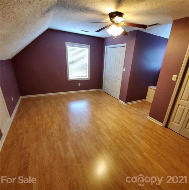 175 Old Airport Road Statesville, NC 28677 - Photo 8 of 15 a view of an empty room and window