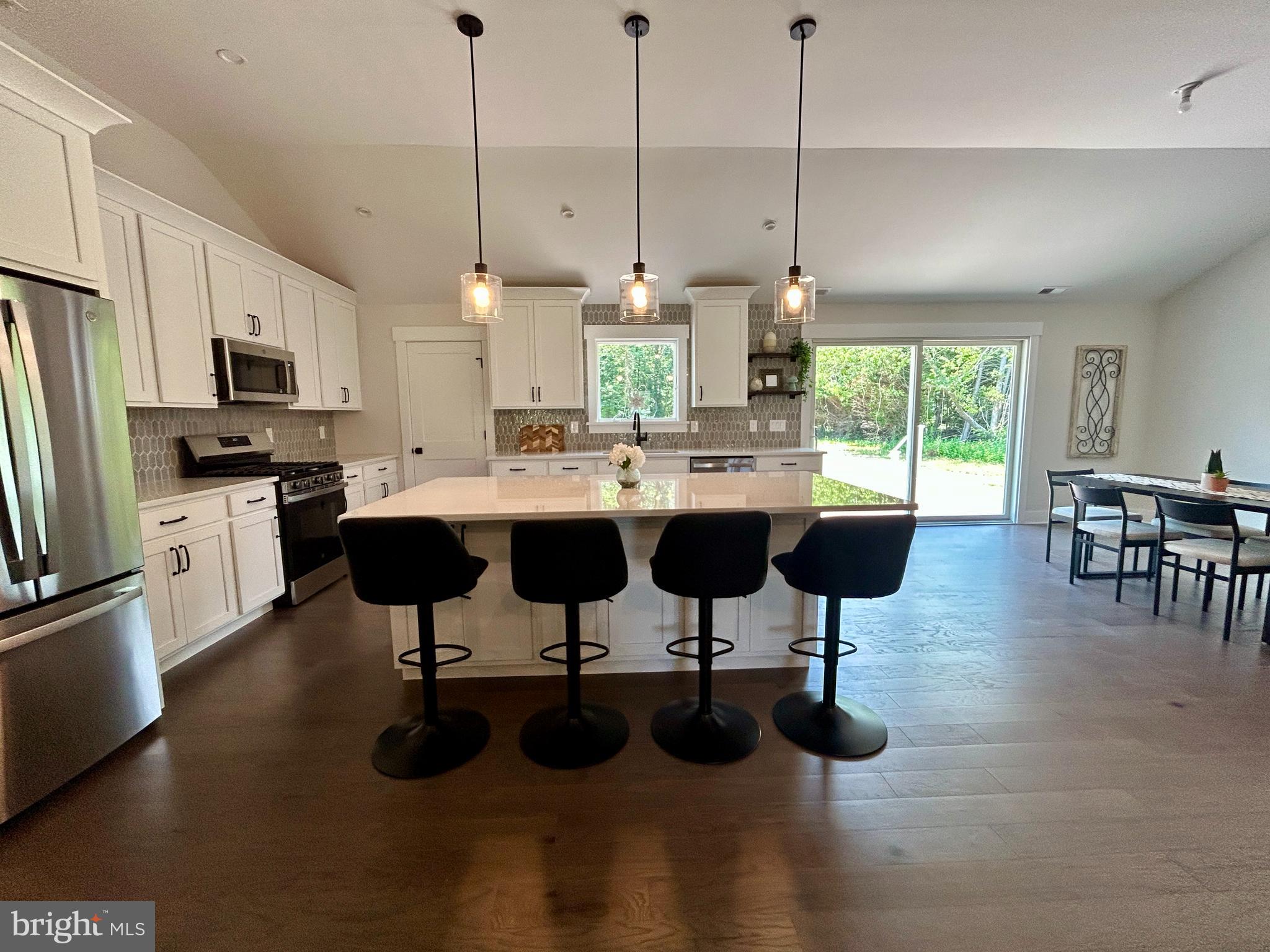 210 Perry Road Woodbine, NJ 08270 - Photo 17 of 35 a kitchen with lots of counter space furniture and appliances
