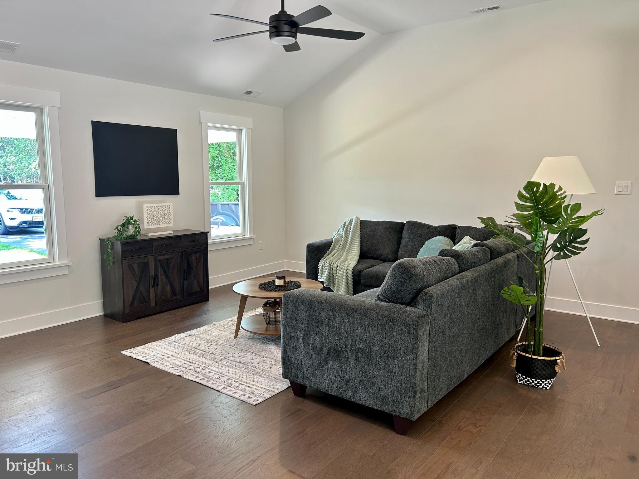 210 Perry Road Woodbine, NJ 08270 - Photo 19 of 35 a living room with furniture and a flat screen tv