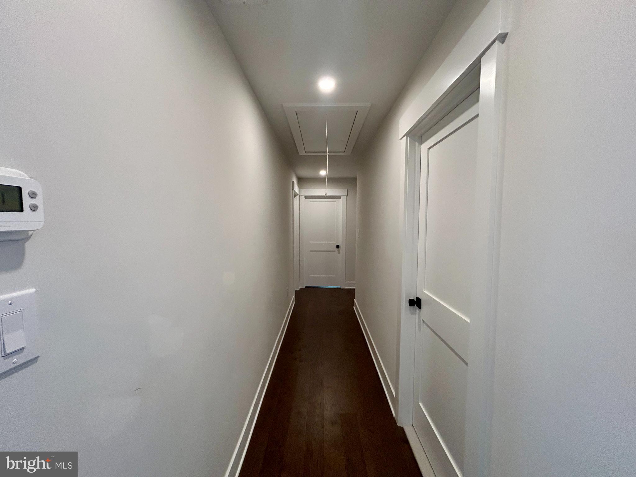 210 Perry Road Woodbine, NJ 08270 - Photo 26 of 35 a view of a hallway with wooden floor and closet