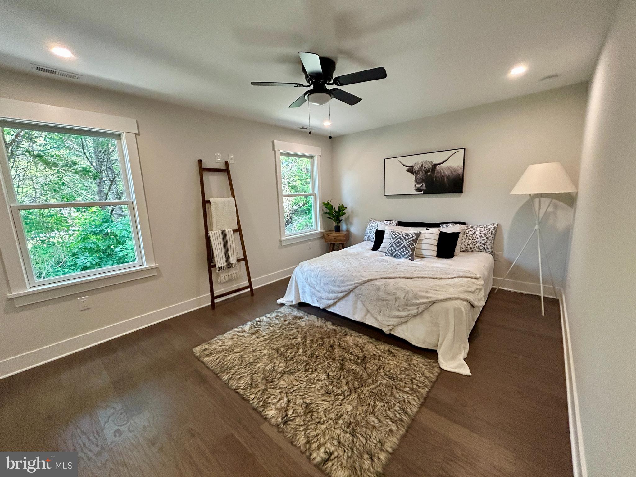 210 Perry Road Woodbine, NJ 08270 - Photo 27 of 35 a bedroom with a large bed and a window