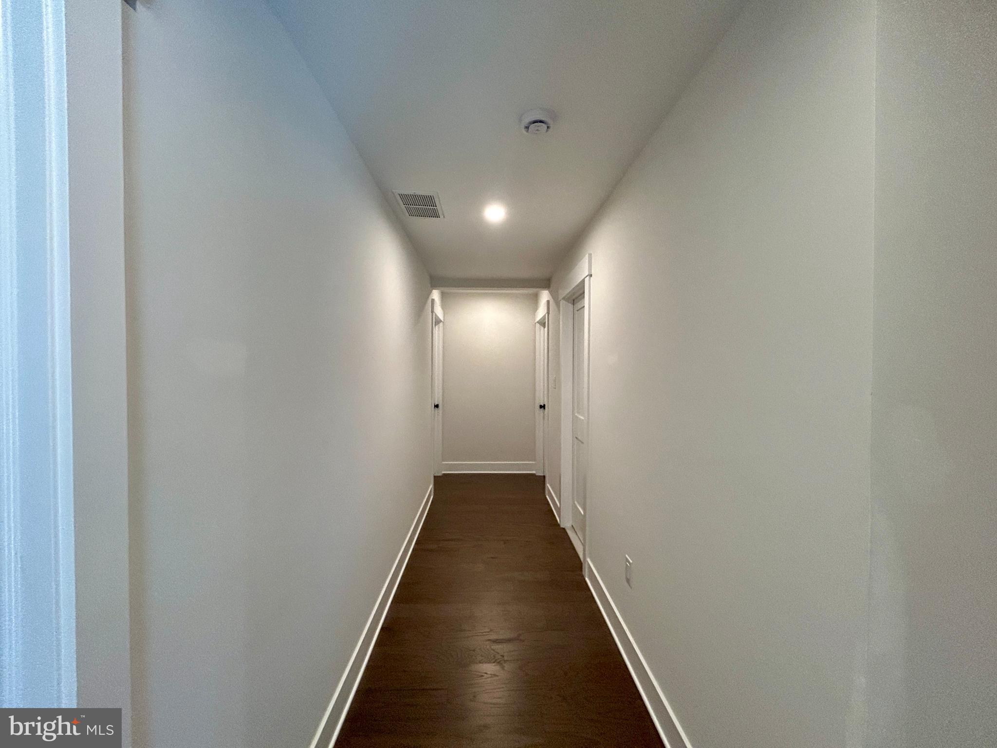 210 Perry Road Woodbine, NJ 08270 - Photo 30 of 35 a view of hallway with wooden floor