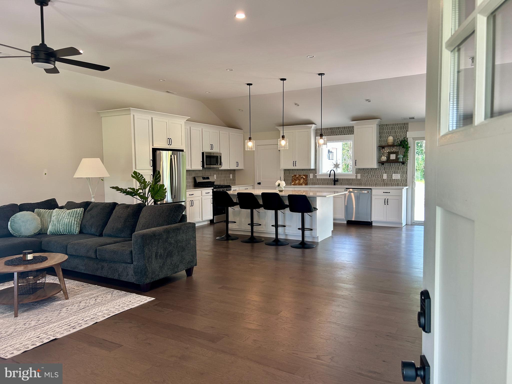 210 Perry Road Woodbine, NJ 08270 - Photo 7 of 35 a living room with furniture and kitchen view