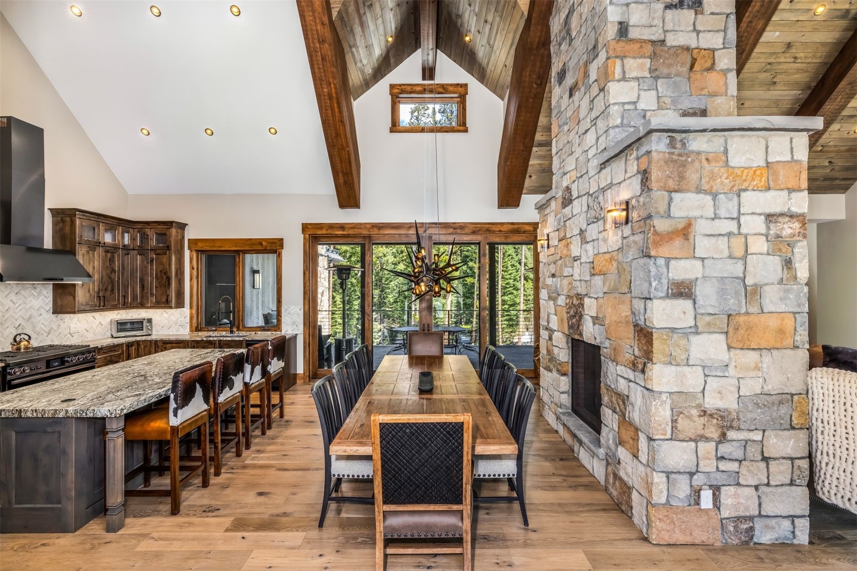 99 Independence Lane Keystone, CO 80435 - Photo 12 of 50 a view of a dining room with furniture window and outside view