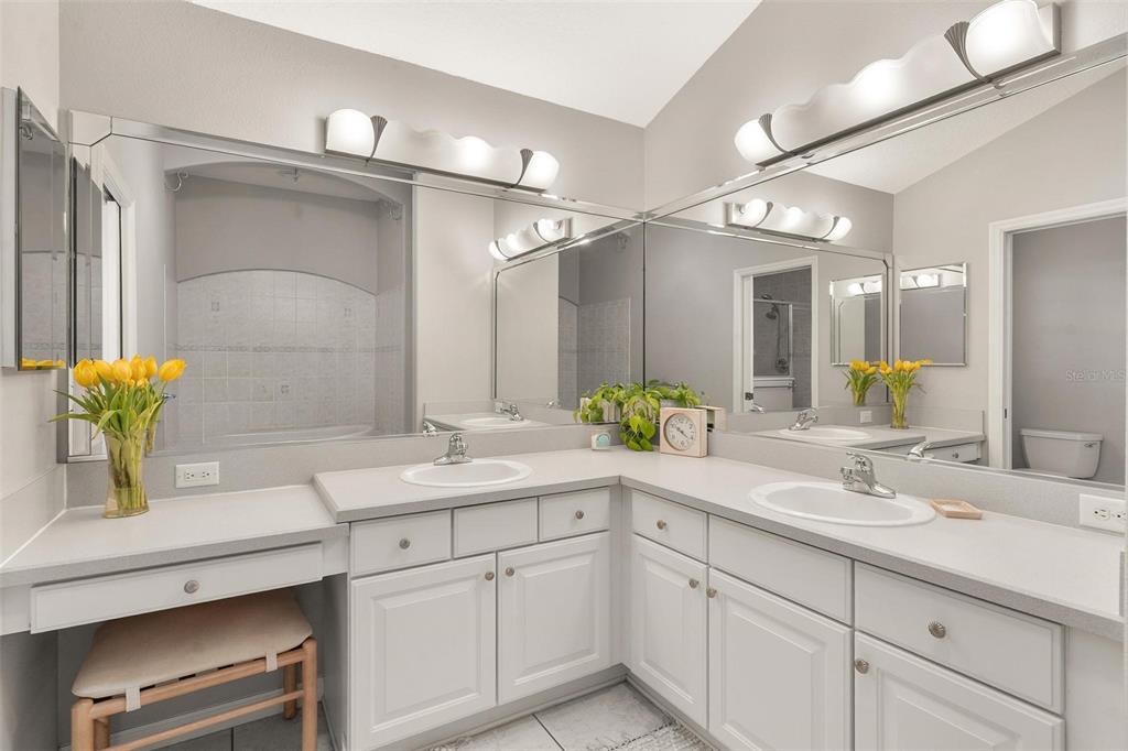 1027 Urico Road Lady Lake, FL 32159 - Photo 23 of 49 a bathroom with a sink and a mirror