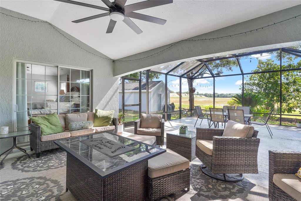 1027 Urico Road Lady Lake, FL 32159 - Photo 33 of 49 a living room with couch and a large window