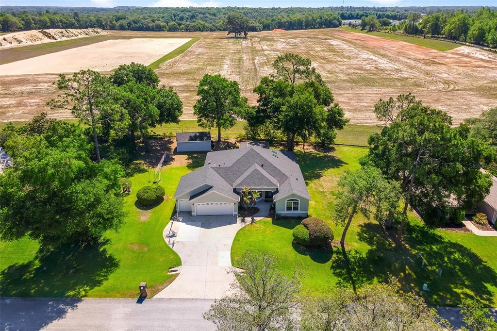 1027 Urico Road Lady Lake, FL 32159 - Photo 43 of 49 an aerial view of residential house with outdoor space and lake view