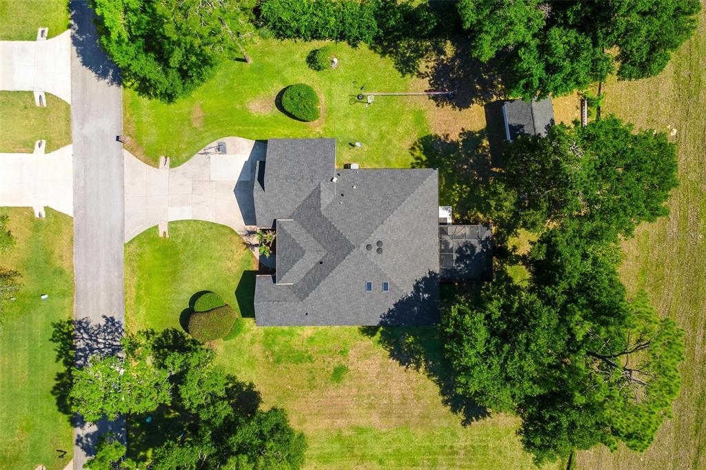 1027 Urico Road Lady Lake, FL 32159 - Photo 49 of 49 an aerial view of a swimming pool