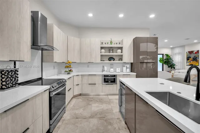 a kitchen with a sink and a large window