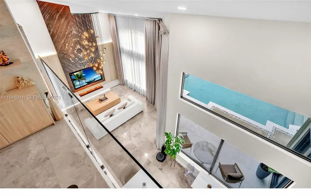 a bathroom with a double vanity sink toilet and shower