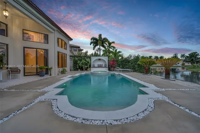 a view of a garden with a pond