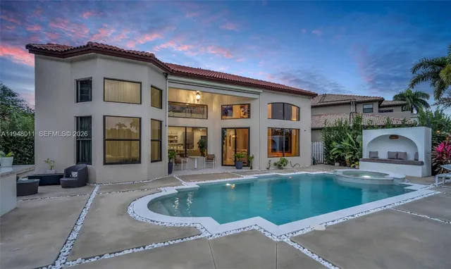 a front view of house with small garden