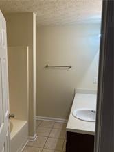 4332 Park Gate Way, Unit 175 Atlanta, GA 30344 - Photo 11 of 12 a bathroom with a sink and a bathtub