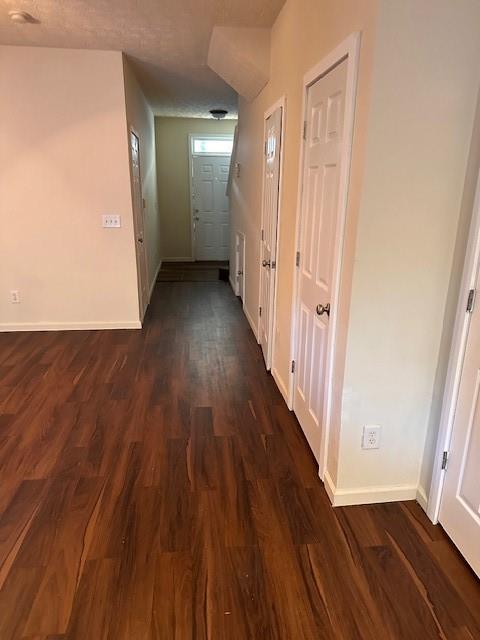 4332 Park Gate Way, Unit 175 Atlanta, GA 30344 - Photo 3 of 7 a view of a hallway with wooden floor and staircase