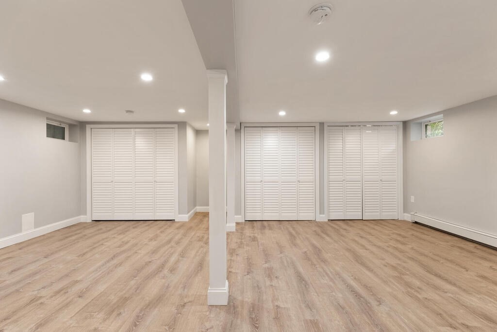 8 Smith Road Randolph, MA 02368 - Photo 19 of 31 a view of an empty room with wooden floor