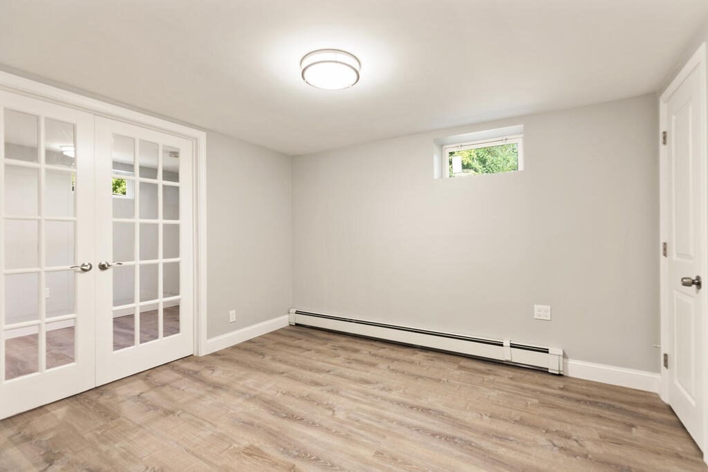 8 Smith Road Randolph, MA 02368 - Photo 20 of 31 an empty room with a natural light