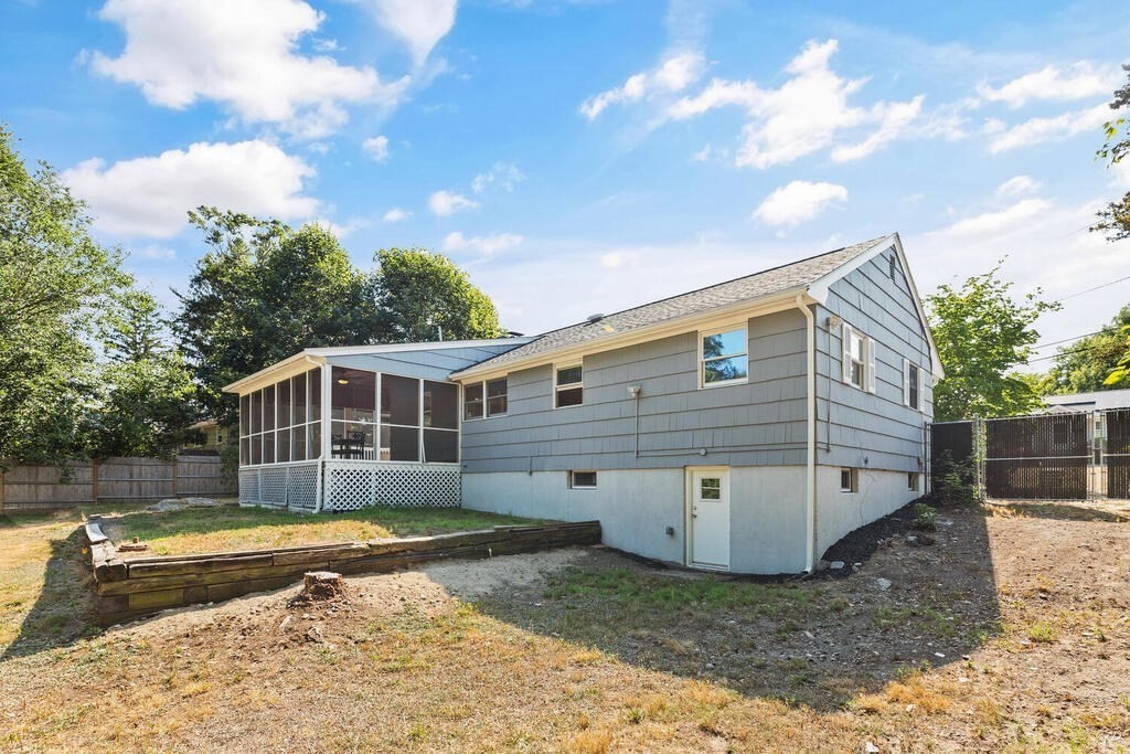8 Smith Road Randolph, MA 02368 - Photo 25 of 31 a view of a house with a yard