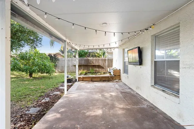 a view of a porch in front of a house
