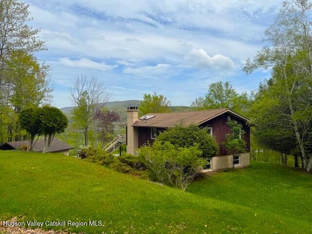 89 Siam Road Windham, NY 12496 - Photo 29 of 31 a front view of a house with garden