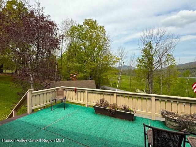 89 Siam Road Windham, NY 12496 - Photo 6 of 31 a view of a deck with a yard