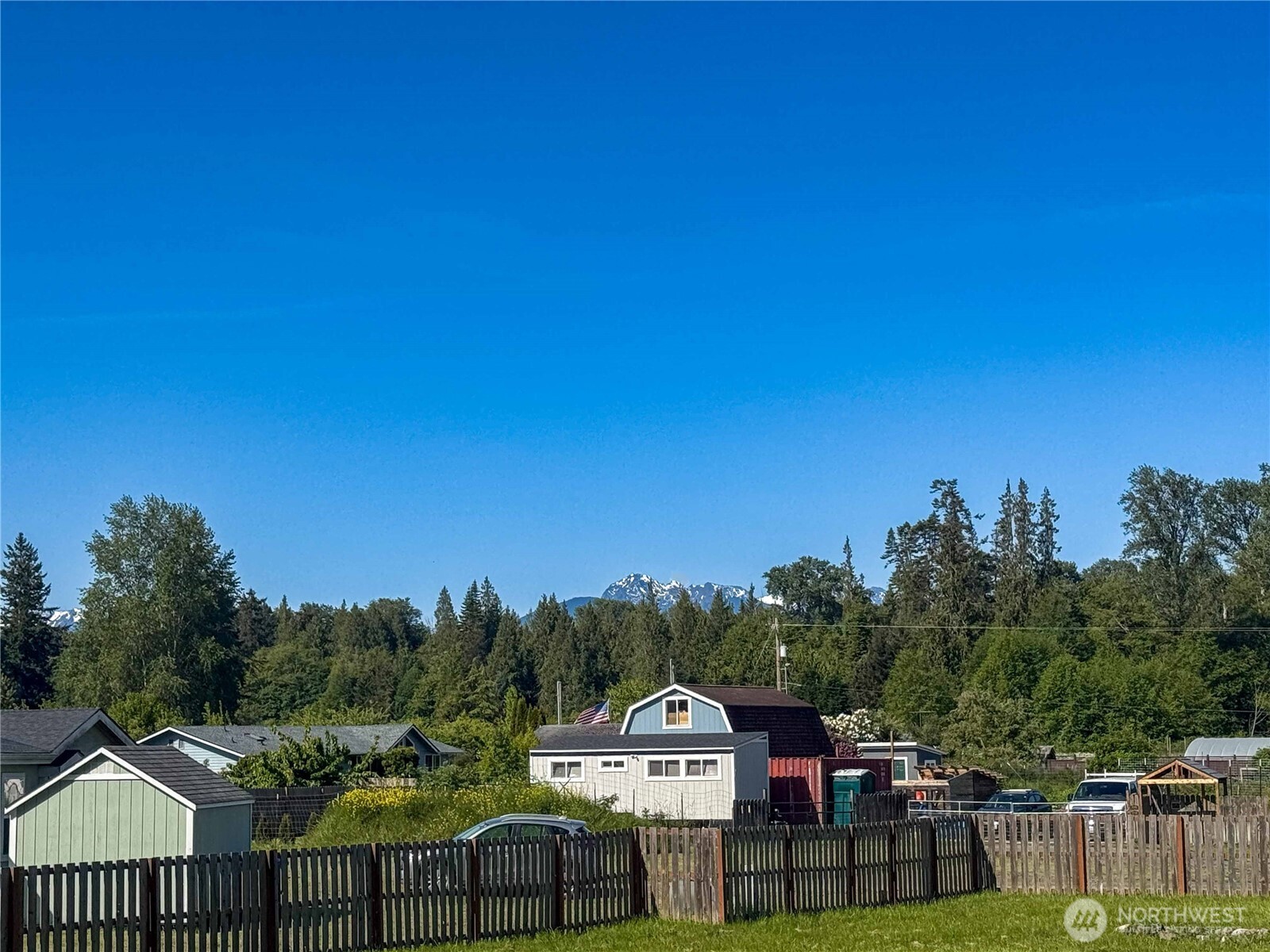2 Community Lane Sequim, WA 98382 - Photo 13 of 33 a view of a houses with a city skyline